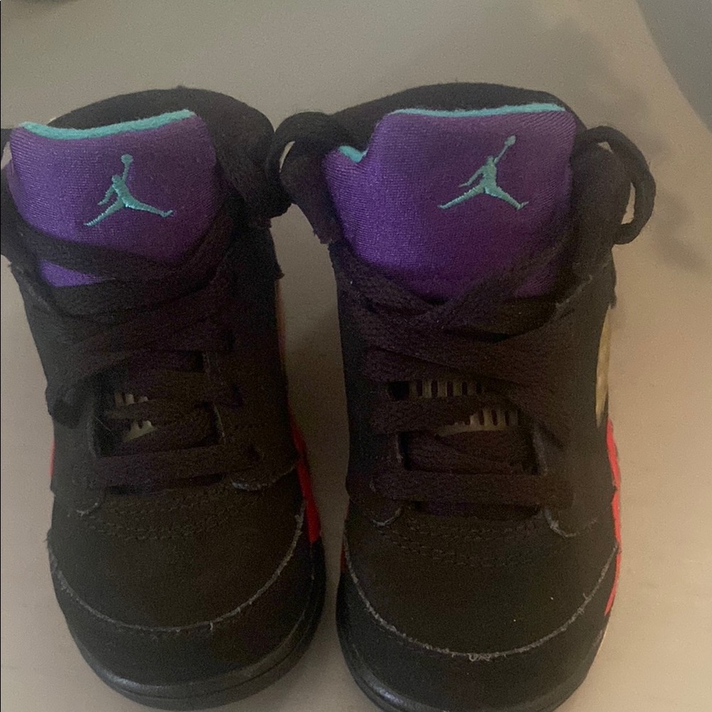 Kids Jordan Black and Purple Sneakers